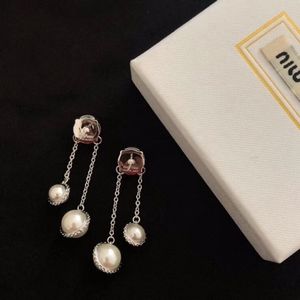 Miumiu luxury light luxury niche style earrings